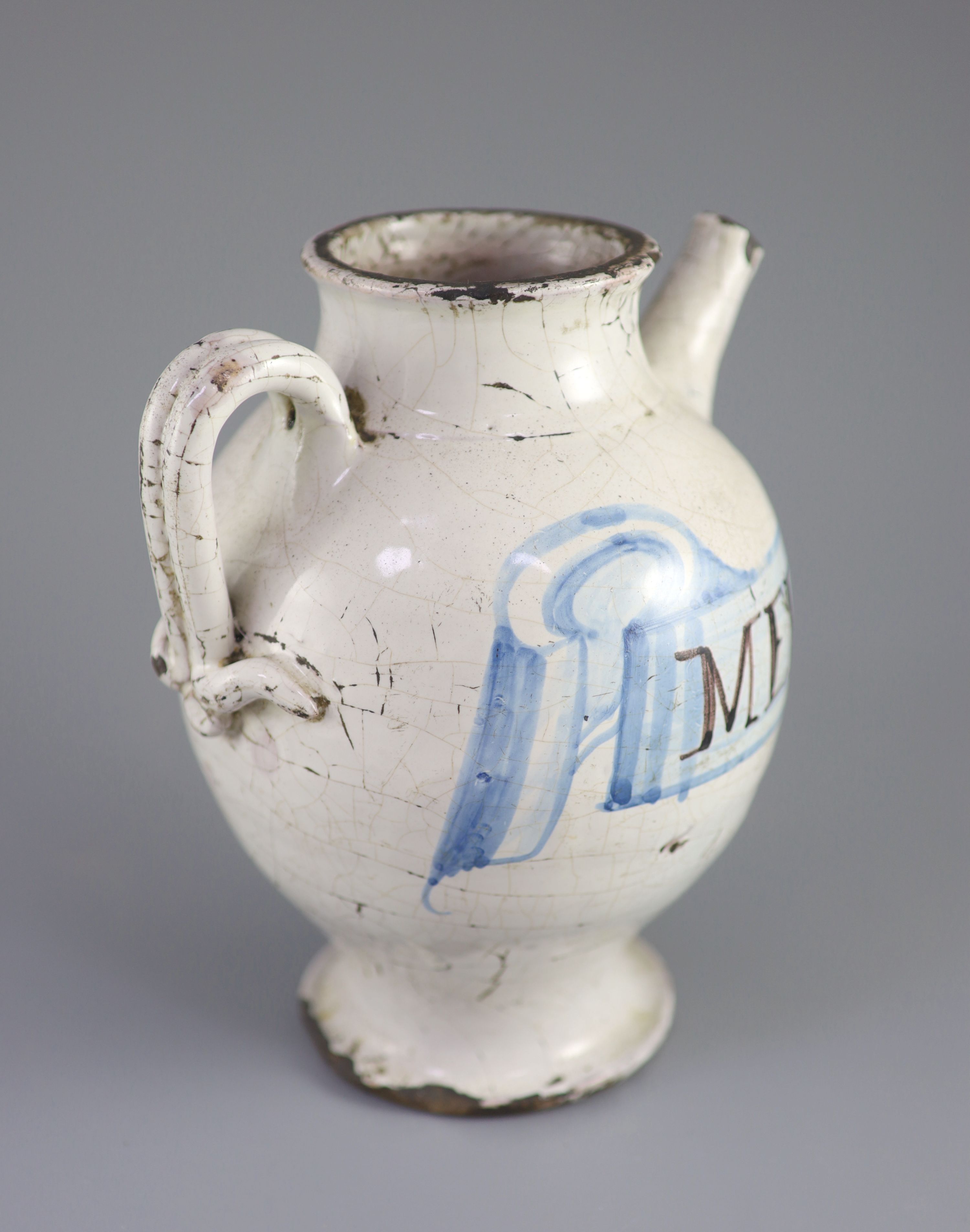 An Italian maiolica wet drug jar, Savona, late 17th century, 22.5cm high, faults